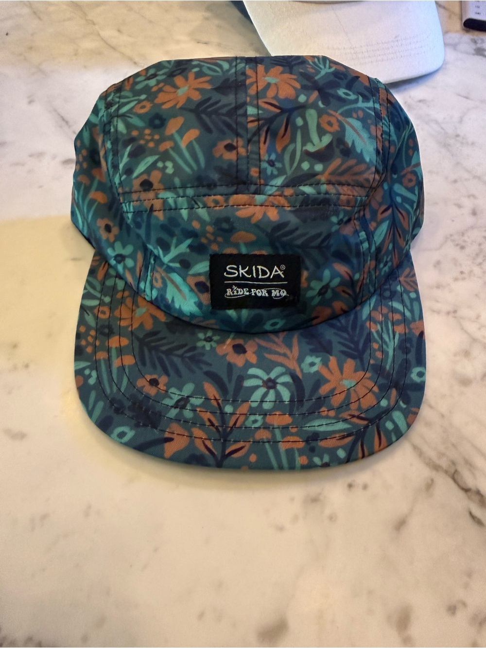Skida Floral Five-Panel Cap in Teal & Rust
